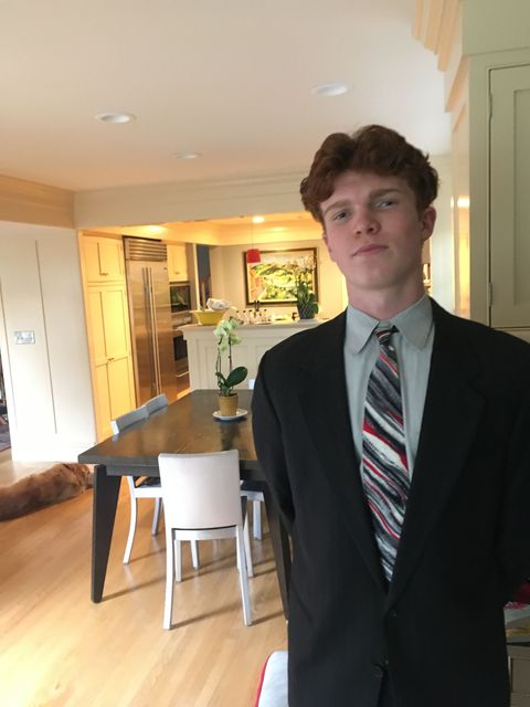 Robert rocks his Dad's 90's wardrobe
